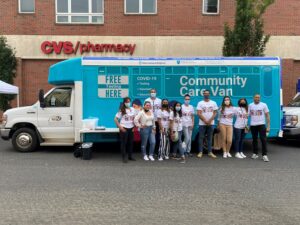 The Kraft Community Health Center's mobile testing and vaccination van and outreach staff.